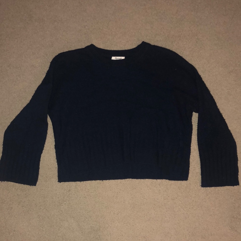slightly cropped oversized navy sweater